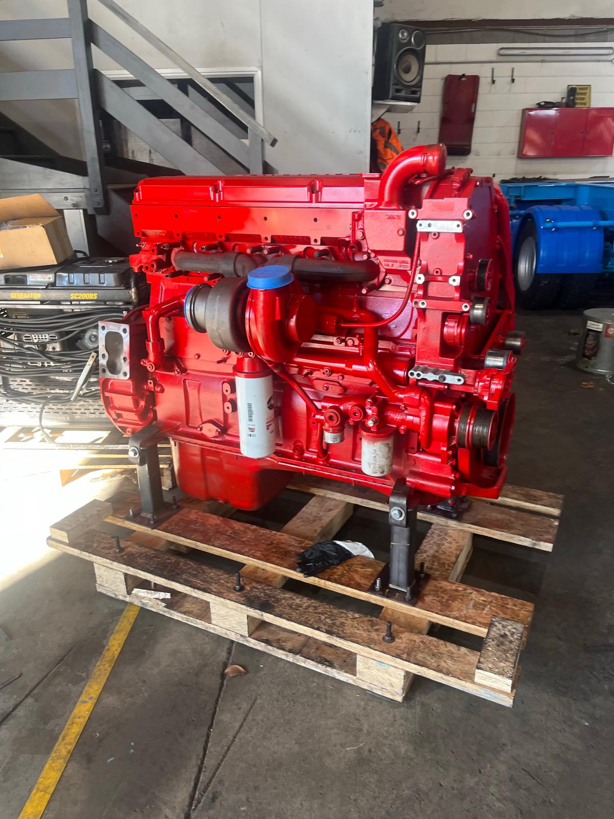 Fully rebuilt Cummins diesel engine on the workshop floor